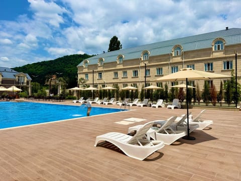 Property building, Natural landscape, Mountain view, Pool view, Swimming pool