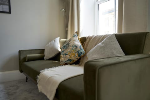 Bed, Living room, Seating area