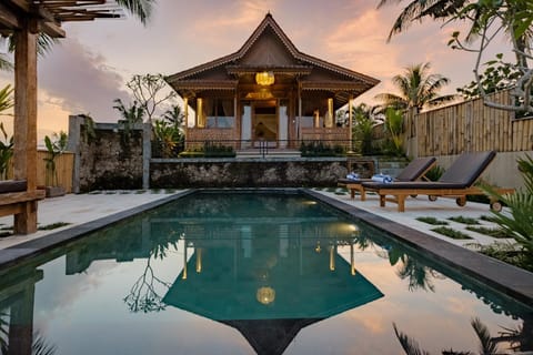 Property building, Patio, Natural landscape, Garden, Pool view, Swimming pool, sunbed