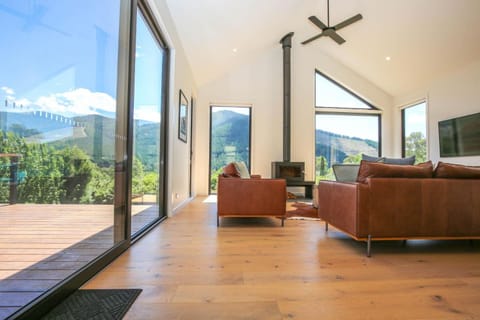 Patio, Natural landscape, Living room, Seating area, Mountain view, fireplace