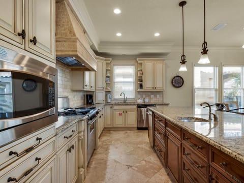 Kitchen or kitchenette, dishwasher, oven, stove, toaster