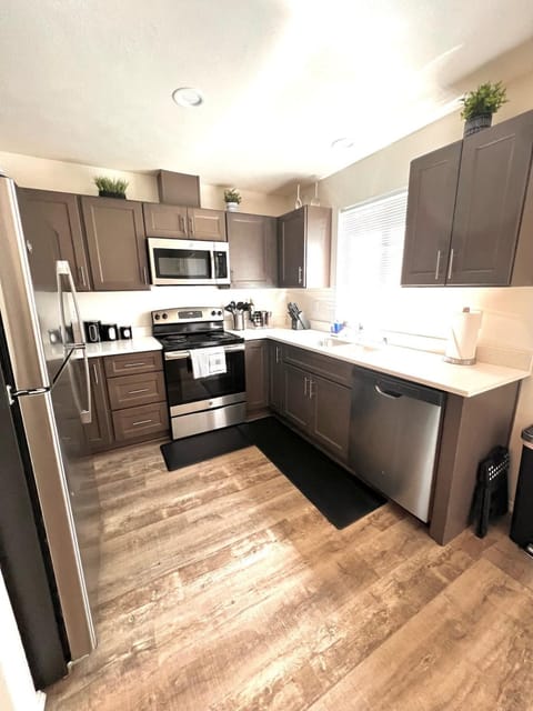 Kitchen or kitchenette, dishwasher, oven, stove, toaster