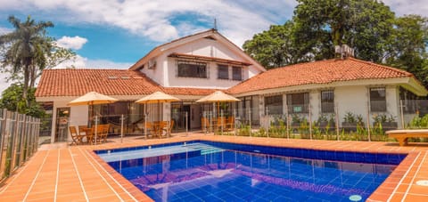 Property building, Pool view, Swimming pool, sunbed