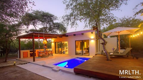 Property building, Patio, Garden view, Swimming pool, sunbed