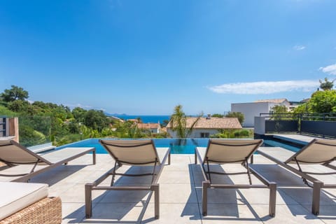 Property building, Living room, Swimming pool