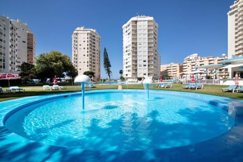 Property building, Living room, Swimming pool