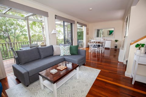 View (from property/room), Balcony/Terrace, Kitchen or kitchenette, Living room, Seating area, Dining area, furniture, air conditioner
