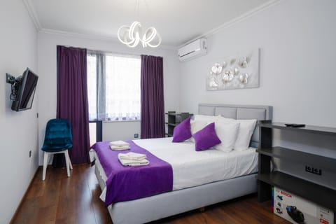 Bed, Photo of the whole room, Bedroom, towels, air conditioner