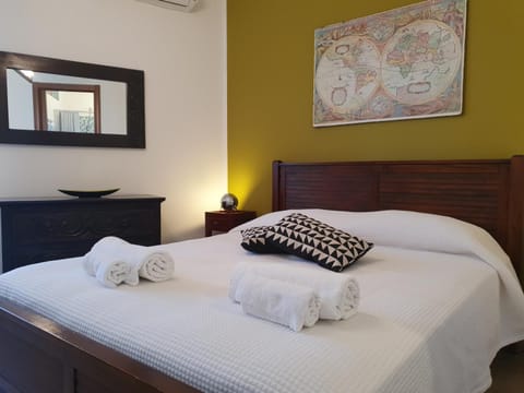 Bed, Bathroom, Balcony/Terrace, Photo of the whole room, Decorative detail, Bedroom, hair dryier, towels, air conditioner