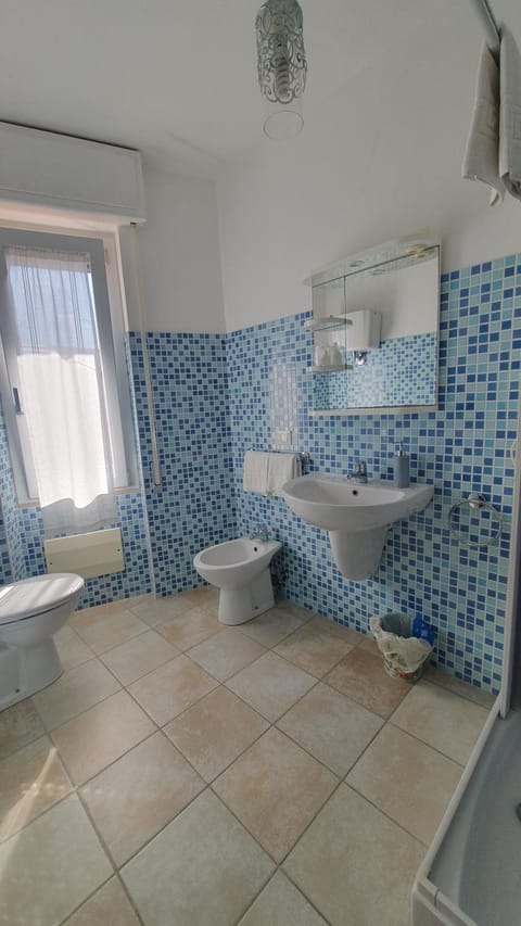 Shower, Toilet, Bathroom, hair dryier, towels