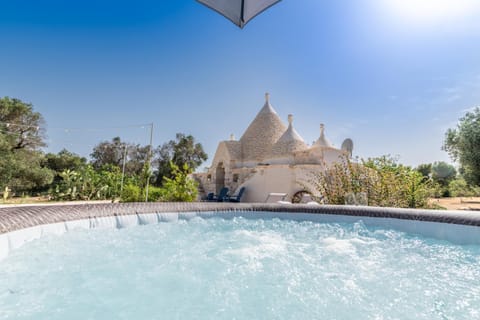 Property building, Living room, Swimming pool