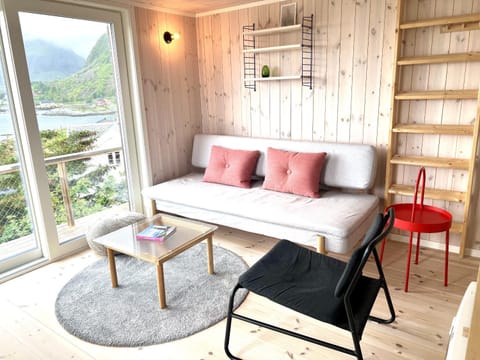 View (from property/room), Living room, Seating area, Mountain view, Sea view