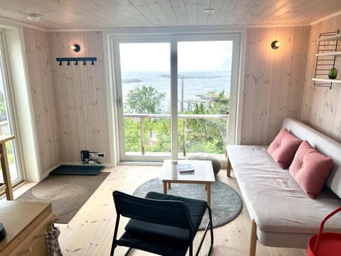 View (from property/room), Living room, Seating area, Mountain view, Sea view