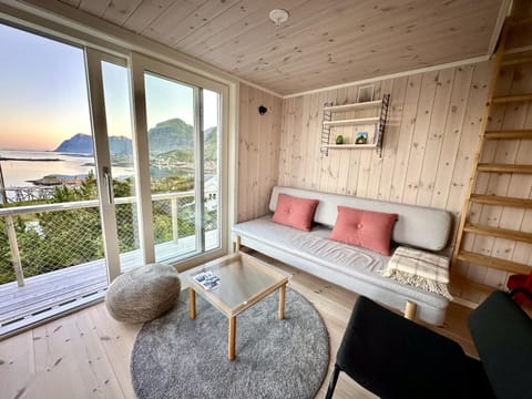 View (from property/room), Balcony/Terrace, Living room, Seating area, Mountain view, Sea view