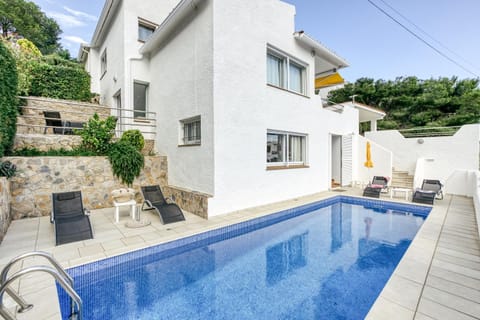 Property building, Living room, Swimming pool