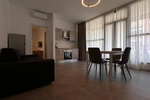 Kitchen or kitchenette, Living room, Seating area, Dining area, stove