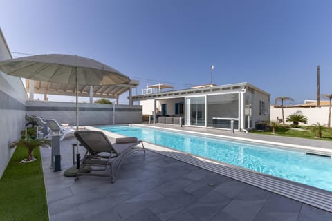 Property building, Living room, Swimming pool