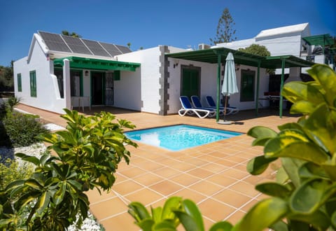 Property building, Living room, Swimming pool