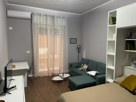 Bed, Living room, Seating area, Bedroom