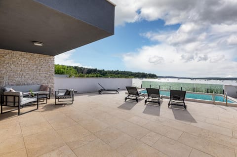 View (from property/room), Balcony/Terrace, Pool view, Swimming pool, sunbed