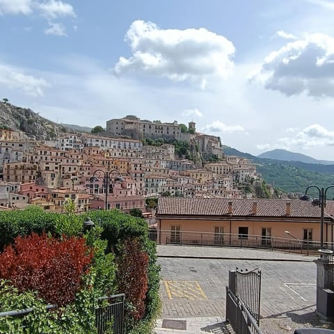 Property building, Nearby landmark, Day, Natural landscape, City view, Mountain view