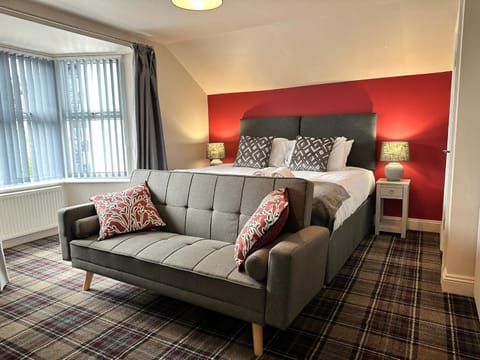 Bed, Seating area, Bedroom