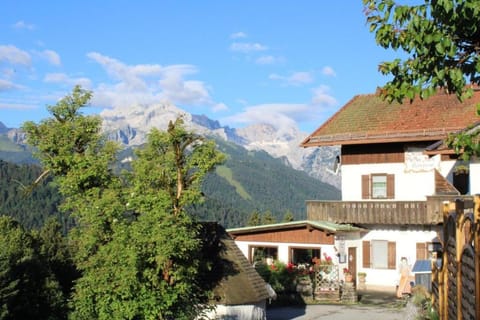 Property building, Nearby landmark, Spring, Day, Natural landscape, Mountain view