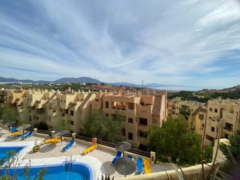 Property building, Day, Natural landscape, Mountain view, Pool view, Swimming pool, sunbed