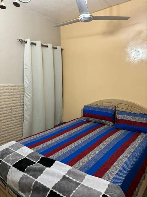 Fully Furnished bedroom with shared bathroom in a villa sharjah Vacation rental in Ajman