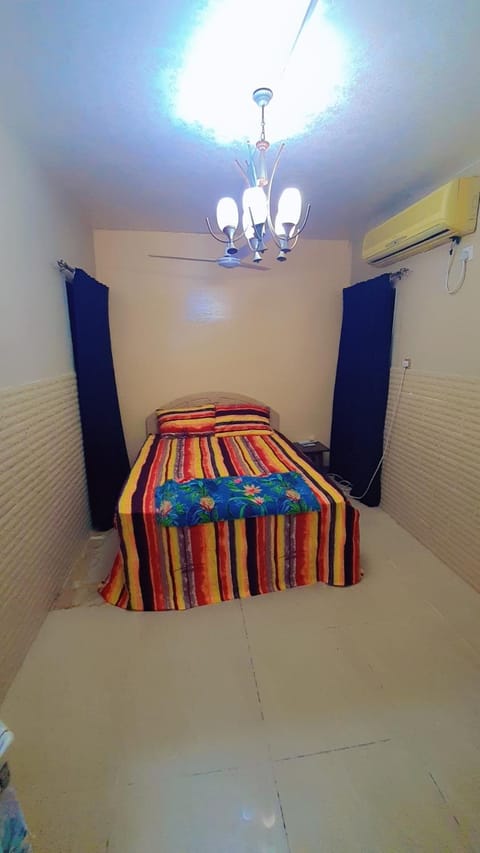 Fully Furnished bedroom with shared bathroom in a villa sharjah Vacation rental in Ajman