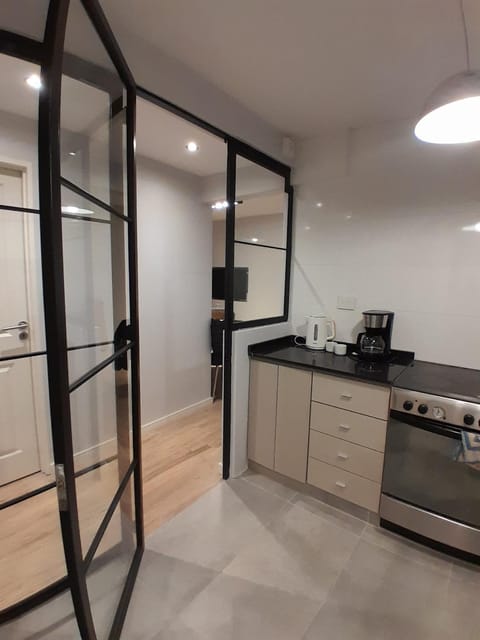 Kitchen or kitchenette, oven