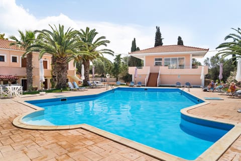 Property building, Living room, Swimming pool