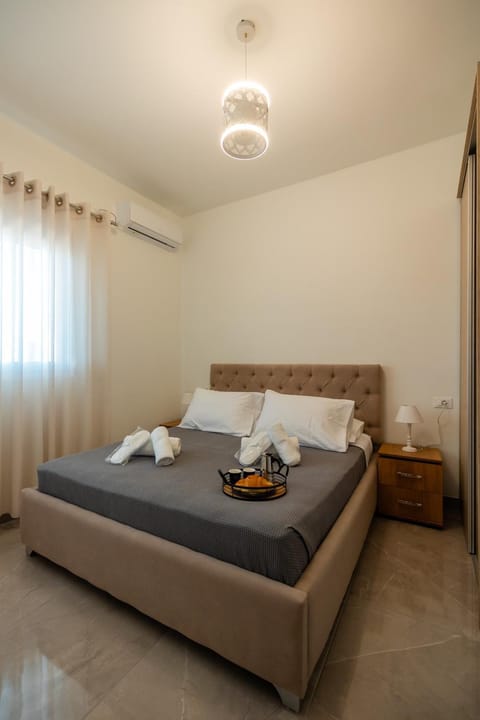 Bed, Photo of the whole room, Bedroom, towels, air conditioner