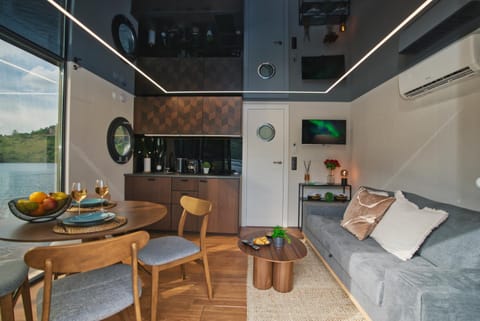 Houseboat by Noma Docked boat in Saint-Étienne