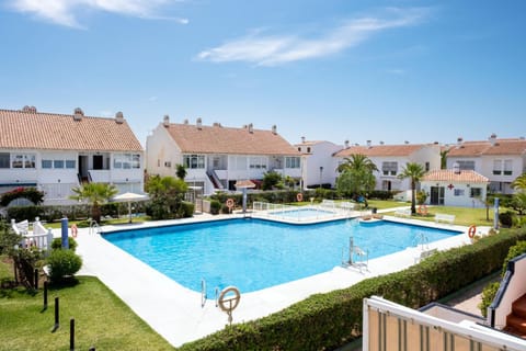 Property building, Living room, Swimming pool