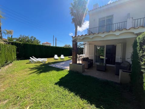 Property building, Patio, Garden, Garden view, sunbed