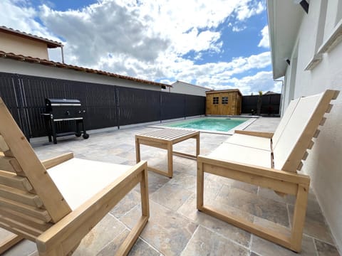 Patio, BBQ facilities, Swimming pool