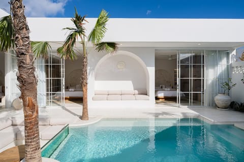 Property building, Patio, Day, Seating area, Pool view, Swimming pool, sunbed