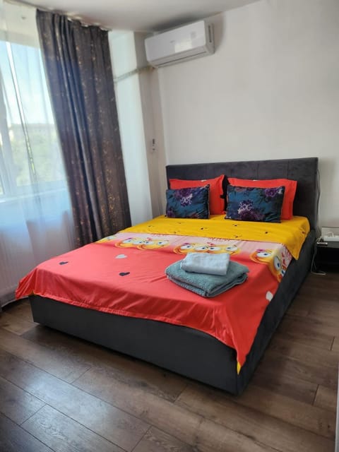 Bed, Photo of the whole room, Bedroom, towels, air conditioner