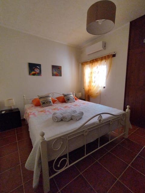 Photo of the whole room, Bedroom, towels, air conditioner