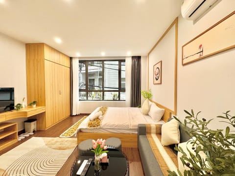 Communal lounge/ TV room, Bed, TV and multimedia, Living room, Photo of the whole room, Seating area, Evening entertainment, Bedroom, air conditioner
