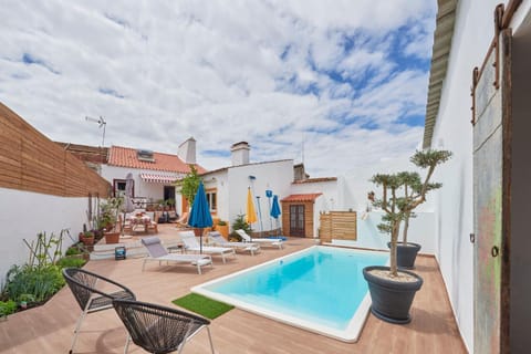 Property building, Living room, Swimming pool