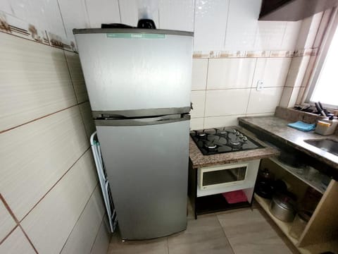 Kitchen or kitchenette, oven, stove