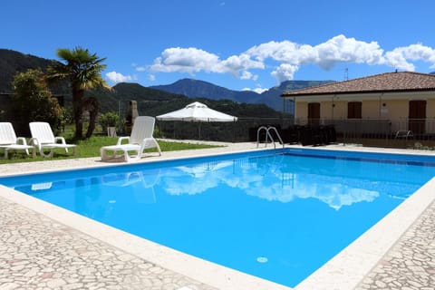 Property building, Day, BBQ facilities, Mountain view, Pool view, Swimming pool, furniture, sunbed