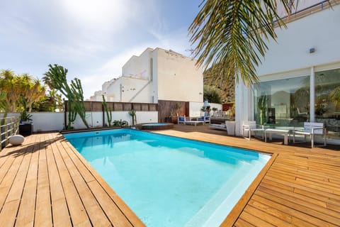 Property building, Living room, Swimming pool
