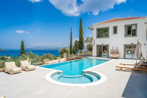 Property building, Patio, Day, Natural landscape, Pool view, Sea view, Swimming pool, sunbed