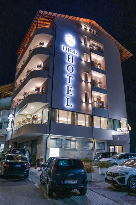 Property building, Night, Text overlay