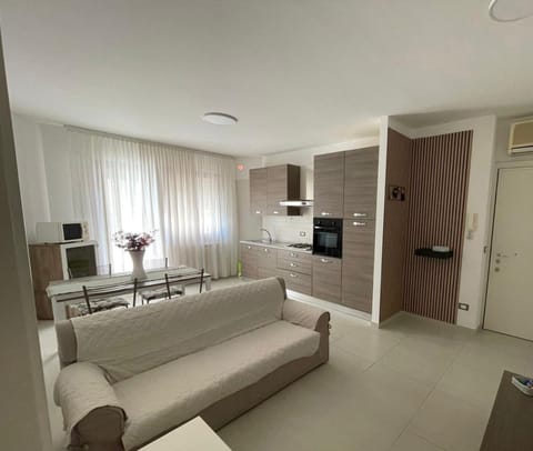 Kitchen or kitchenette, Living room, Dining area, oven, stove, air conditioner