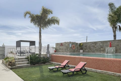 Property building, Living room, Swimming pool