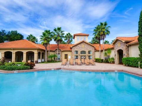 Property building, Patio, Pool view, Swimming pool, sunbed